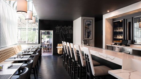 View of the sleek and modern restaurant and bar at the Chamberlain West Hollywood hotel.