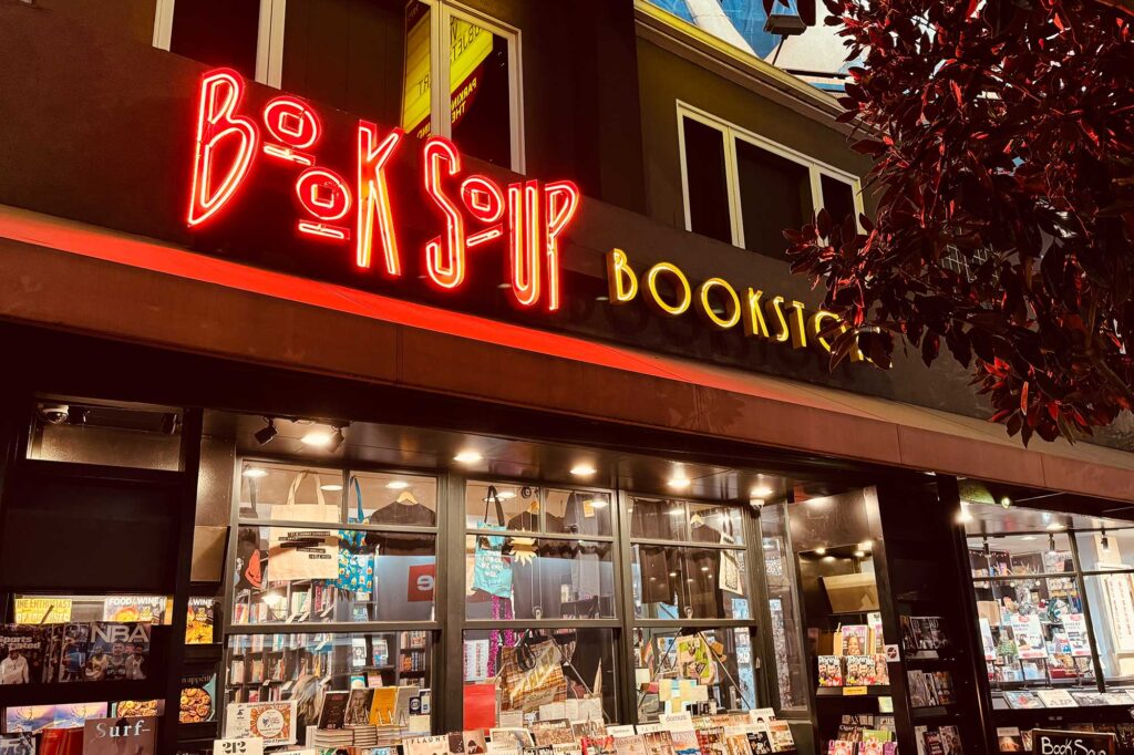 A red neon sign on the exterior of Book Soup in West Hollywood, California.