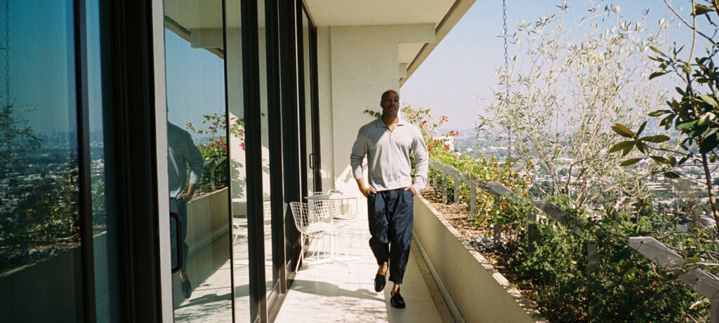 Interior designer Adair Curtis walks on a hotel balcony in West Hollywood