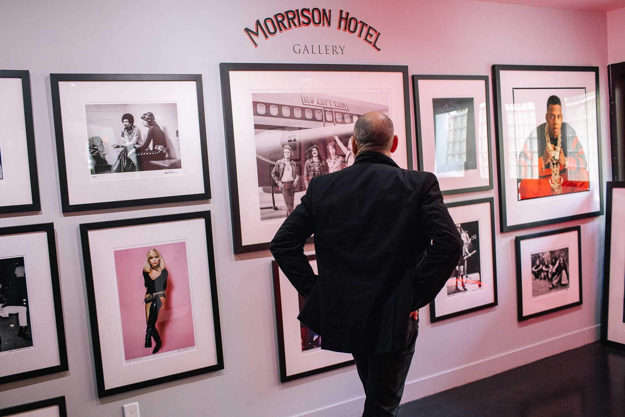 A man views art at Morrison Hotel Gallery in West Hollywood, CA