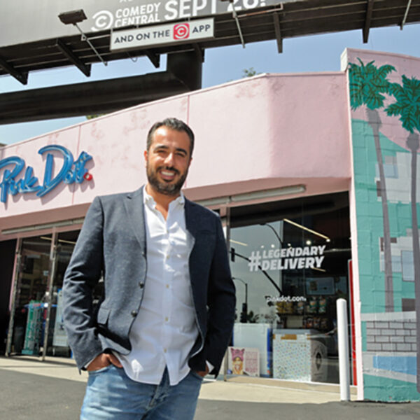 Sol Yamini, owner of West Hollywood's Pink Dot, stands in front of the store's iconic location on Sunset Boulevard.