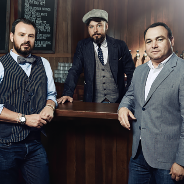 Dimitri Komarov, Bobby Green and Dimitry Liberman, owners of the 1933 Group, pose in retro-styled suits.