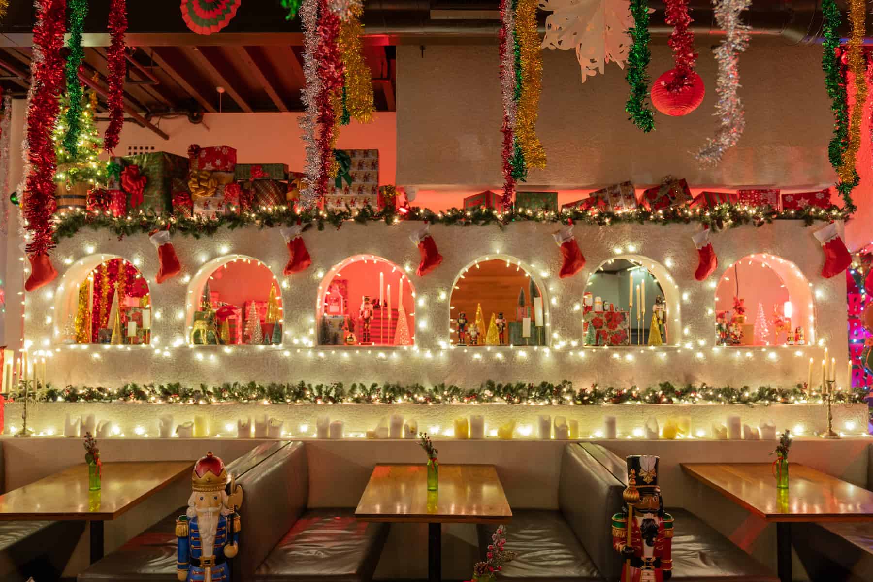 A restaurant is decorated in over-the-top holiday lights and other decorations. Bombo at E.P. & L.P., West Hollywood, California.
