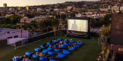 Aerial shot of Melrose Rooftop Theatre with the Hollywood Hills in the background. West Hollywood, California.