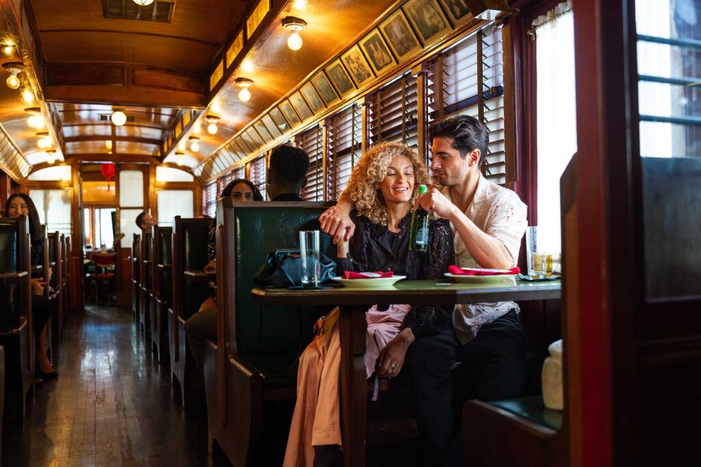 A couple shares a drink inside The Formosa Cafe in West Hollywood, CA