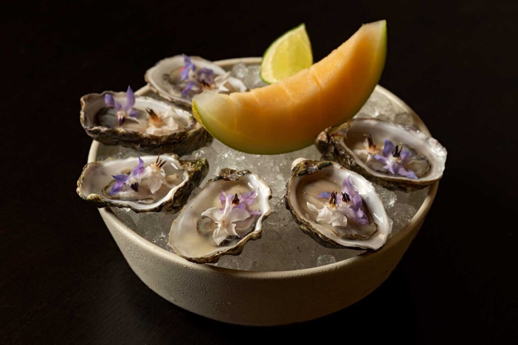 An artful platter of oysters on the half shell at Darling in West Hollywood, CA