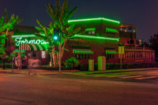 Exterior of The Formosa Cafe in West Hollywood, with its green neon sign.