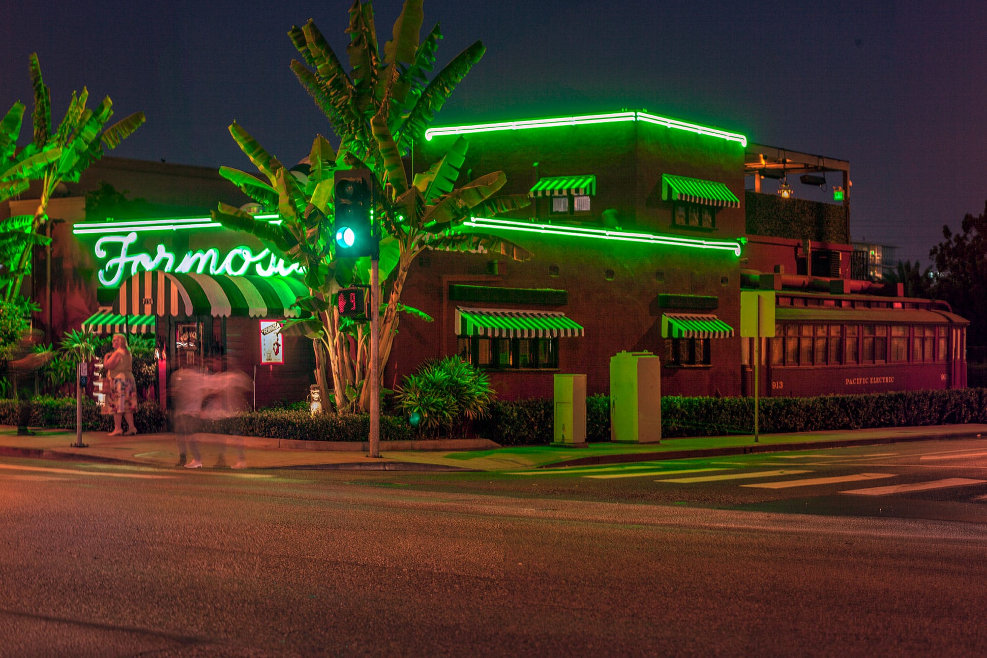 Exterior of The Formosa Cafe in West Hollywood, with its green neon sign.