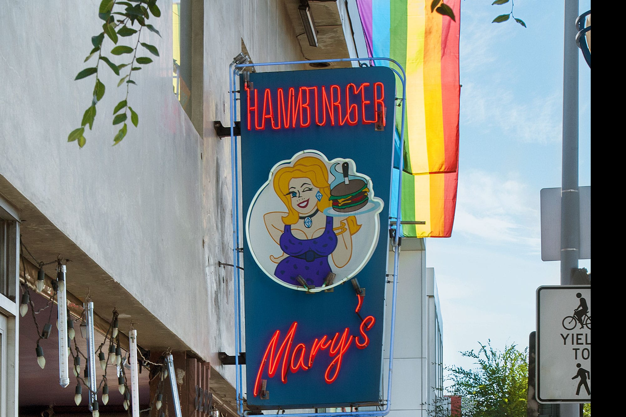 Neon sign for Hamburger Mary's hangs on a building in West Hollywood
