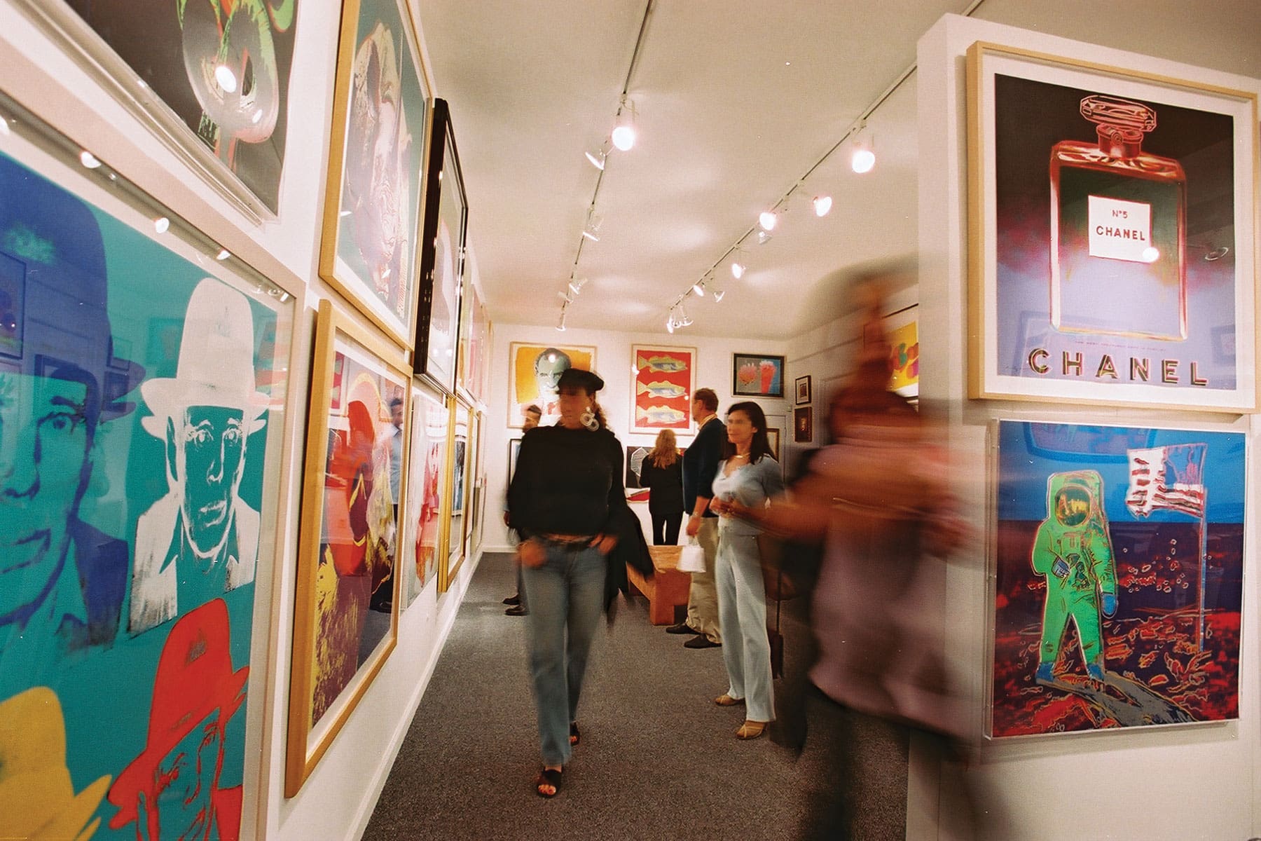 People browsing art inside Hamilton Selway gallery in West Hollywood, California